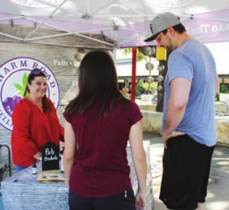 Above: Brandes Bodiford of Pharm Road Wellness Center was among vendors June 13 at the Open Air Market.