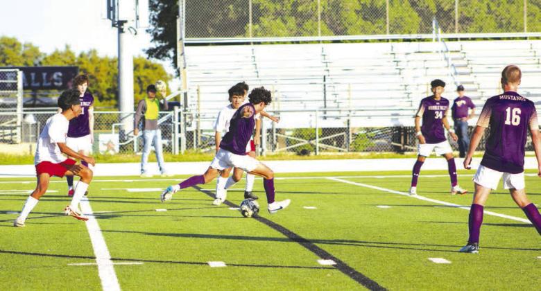 Marble Falls senior Diego shoots and scores from about the eight-yard line in the first half during the win against San Antonio Fox Tech.