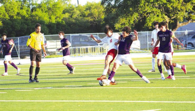 Senior Ivan Espino challenges for the ball in keeping San Antonio Fox Tech off the scoreboard.