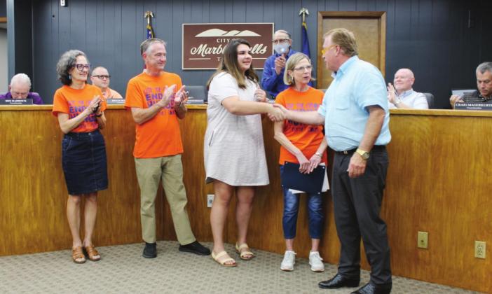 Mayor Richard Westerman proclaimed September Hunger Awareness Month on Sept. 7 during the regular city council meeting. Pictured, from left, are Bernadette Ellis, Helping Center Executive Director Sam Pearce, newly-hired and first full-time employee Jaelyn Nelson, Alliance representative Pam Rodgers and Westerman. Connie Swinney/The Highlander
