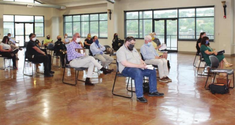 The Highlander Lakeside Pavilion – the largest event venue in the city – is now the site for city council meetings (pictured here in September) which moved from city hall to accommodate “social distancing” requirements mandated by the state. A highly-attended Friends of NRA event is sorting through those types of requirements as well as occupancy limits for its planned Sept. 10 fundraiser at the venue. Connie Swinney/The Highlander