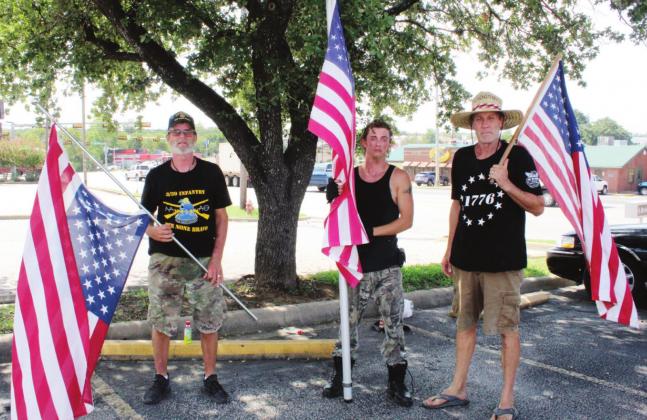 From left: Dave Oxford, Joshua Shirley and Shawn McDaniel ended their 13-mile march from Kingsland to Marble Falls near the intersection of RR 1431 and US 281 on Friday, Sept. 3.. 