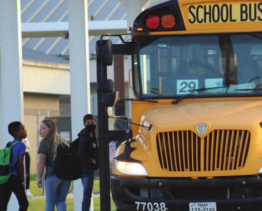 The school district will reduce bus routes due to a shortage of drivers. Pictured here are Marble Falls Middle School students at the beginning of the school year. File photo