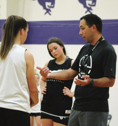 Assistant Coach Adley Canales talked defensive rotations at a recent practice. The Lady Mustangs begin their season on Saturday in Killeen. Nathan Hendrix/The Highlander