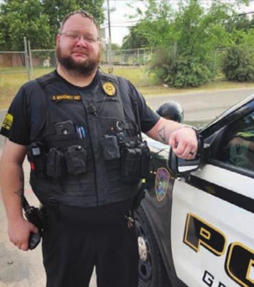 Granite Shoals Deputy Shane Mahoney is credited with keeping parents calm, cool and collected as they waited for an emergency crew to come to tend to their newborn, who was delivered in their vehicle on the side of the road. Contributed