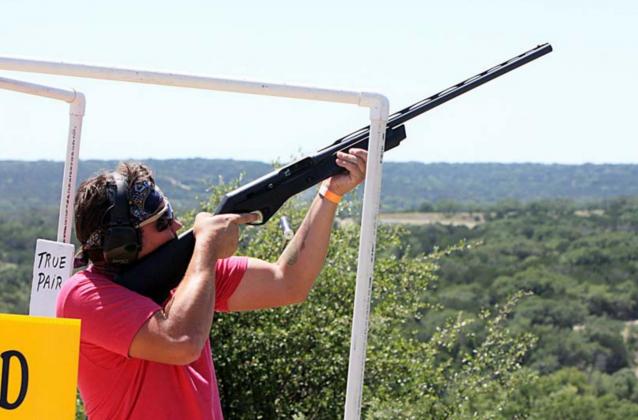 Charles Malone takes aim at a clay target during the annual Shoot for Coop tournament held Sunday at Despain Ranch. The event was moved to June 13 due to concerns about COVID-19.Photos by Kelly McDuffie Contributing Photographer