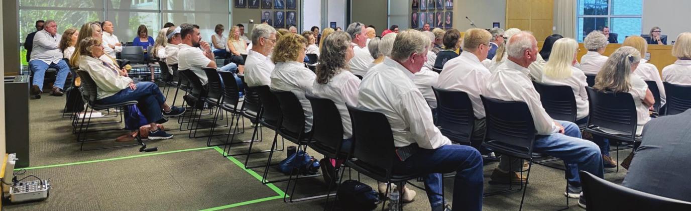 On Nov. 17 LCRA board members approved a new dredge and fill ordinance for the Highland Lakes. Dozens of people interested in the item attended including opponents of commercial dredging operation, who wore white in solidarity against lifting a moratorium on commercial permits.