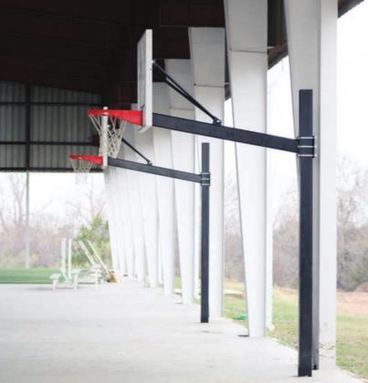 The basketball hoops erected under the roofing has already seen its share of users, city officials reported. Residents are now asked to stay off the courts until floors are finalized. Nathan Hendrix/The Highlander