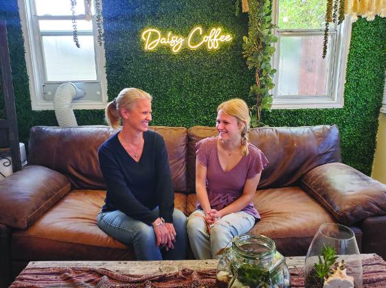 Tami Chaney and her daughter Taylor Vaandrager recently spent time refurbishing the inside of Daisy Coffee Co. in a converted dwelling with cozy ambience in several areas of the business. Photos by Connie Swinney/The Highlander