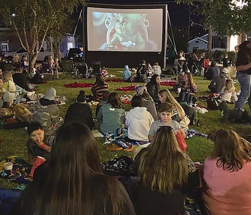 Several activities bring the community of Marble Falls together, including outdoors movies, adjacent to Harmony Park.