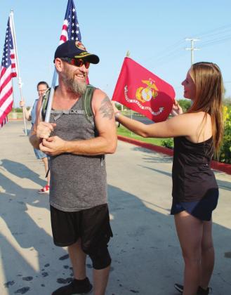 Marine Corps veteran David Wright of Horseshoe Bay and his daughter Nicole were among participants of the Patriot Day march on Sept. 11 from Kingsland to Marble Falls. Connie Swinney/The Highlander
