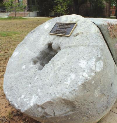 The stone is part of a rubble wall that was once on Marble Falls ISD property next door. When the school district decided to remove the wall, the museum gathered the rubble, which represents how walls and fences were built in a time without concrete.