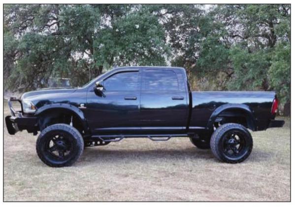 The black and white crew cab Ram trucks are still missing, according to task force investigators.