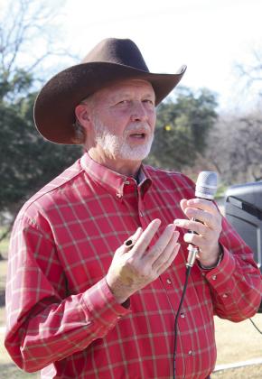 Hunter Burnham, a Burnham family descendant, spoke to the many attendees at the dedication of a memorial to his forebears installed in Lakeside Park in Marble Falls and celebrated Jan. 30. Raymond V. Whelan/ The Highlander