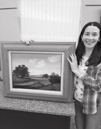 Melissa Brown is the lucky winner of a beautiful landscape painting by Peggy Cain at Highland Arts Guild &amp; Gallery during the Fall Show drawing. Brown lives in McKinney, Texas. Contributed