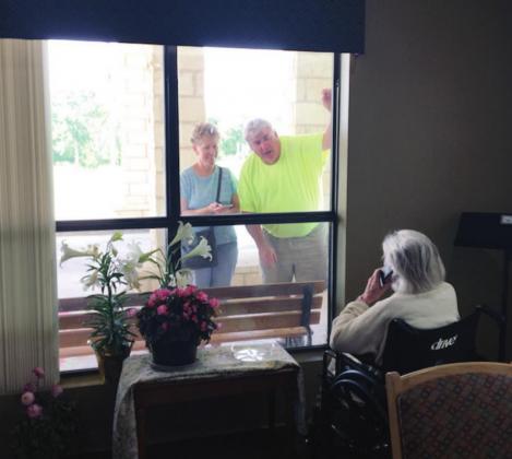 How caregivers get to spend time with their loved ones at Granite Mesa Health Center nursing home in Marble Falls is now dependent upon whether the visitor has received the COVID-19 vaccine or not. During the 2020 virus lockdowns, residents were permitted to interact by phone through a window. File photos