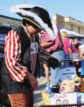 The Bluebonnet Festival will be held from Thursday, April 8 through Sunday, April 11 in downtown Burnet. The pet parade begins Friday at 5:45 p.m. Corbin and his Pomeranian Lulu were a hit at 2019’s event. File photo