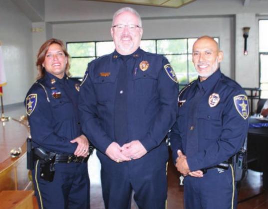 Right: Marble Falls Assistant Police Chief Glenn Hanson, center, will be sworn in as the new chief of police Tuesday, June 29. He is flanked by members of his senior administrative staff — Capt. Trisha Ratliff, head of CID, left, and Capt. Robert Talamantes, head of patrol division.