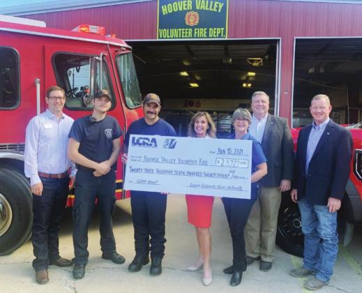 LCRA and Pedernales Electric Cooperative representatives present a $23,727 grant to Hoover Valley Volunteer Fire and Emergency Services for new rescue tools. The grant is part of LCRA’s Community Development Partnership Program. Pictured, from left, are: Jared Fields, PEC; Waylon Hibbitts, firefighter; Marc Talamantez, captain; Carol Freeman, LCRA; Susan Patten, LCRA; Judge James Oakley; and Joe Don Dockery, Burnet County commissioner, Precinct 4. Contributed/LCRA