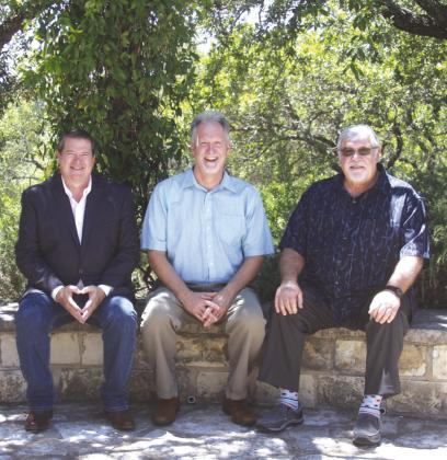 From left, Co-Pastor John Duncan, Malcolm McQueen and the church's former Minister of Music, Garry Kesler enjoyed a few moments outside on a nice day.