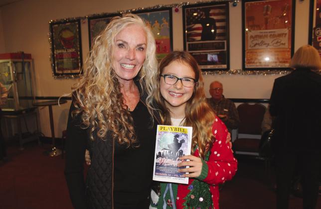 Diane Dalton of Spicewood (left) and her granddaughter Makenzie Hacker saw the Hill Country Community Theatre production of ‘It’s a Wonderful Life: A Live Radio Play’ Dec. 1 in Cottonwood Shores. Raymond V. Whelan/The Highlander