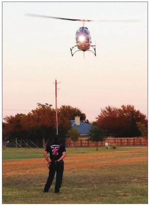 The Marble Falls National Night Out event was visited by Air Evac (left) in thrilling fashion. Contributed/Amanda Langley
