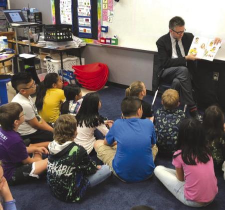 Contributed photo Marble Falls Independent School District Superintendent Jeff Gasaway visited Marble Falls Elementary School campus this week and read to students. The book, 'Big Test Jitters' by Julie Danneberg, helped put students at ease over upcoming exams.