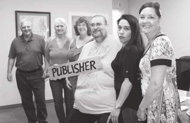 A group of staff members of The Highlander and Burnet Bulletin said farewell to Managing Editor Lew K. Cohn on his last day, Friday, Aug. 27. Connie Swinney/The Highlander