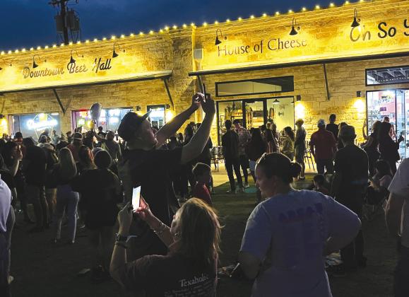 Below, hundreds of people visited downtown Marble Falls for the Eclipse Block Party in Harmony Park at Third and Main. Attendees witnessed darkness, during the total solar eclipse around 1:36 p.m. that lasted about four minutes. Jeff Shabram/The Highlander