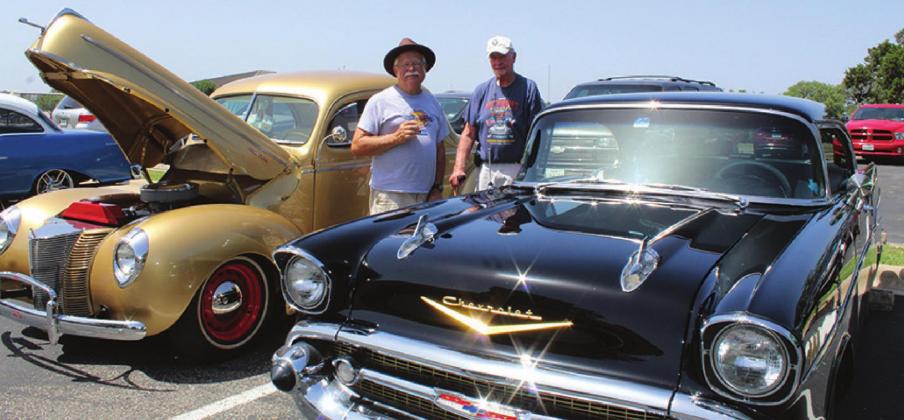 Aubrey Cornelius presented his ’57 Chevy while Frank Caramanica, on the left, featured his 1940 Deluxe 5 Window Coupe during a car show for residents of Gateway Gardens/Gateway Villas on June 17 in Marble Falls. Photos by Connie Swinney/The Highlander