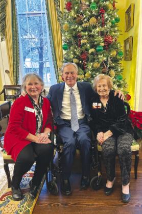 Burnet County Republican Women attend a Christmas reception for the Texas Federation of Republican Women Patrons at the Governor's Mansion. Pictured are Carolyn Richmond and Gail Teegarden, who sat for a photo with Gov. Greg Abbott as well as toured the historic venue. Contributed photos