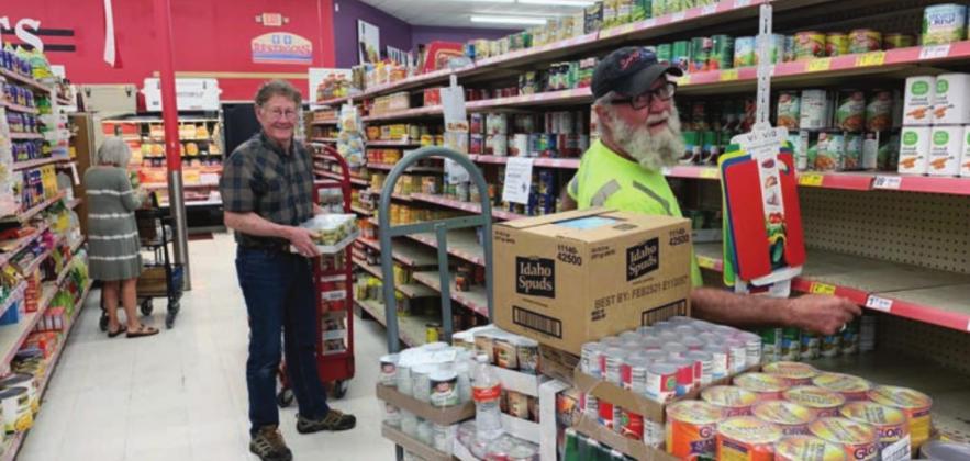 During the height of the pandemic, community members helped Lowe’s Market in Llano, pictured here, re-stock shelves. In light of the lifting of the virus restriction, the store manager said he will make it the customer’s choice whether to wear face coverings or not. File photo