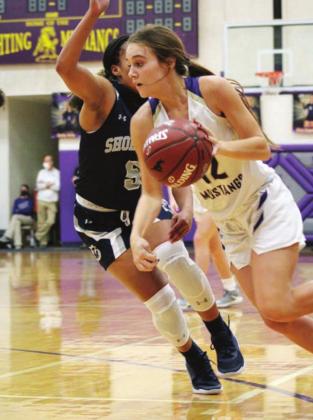 Avie Nail showcased an improved skill set on opening night for the Lady Mustangs. She displayed crafty ball handling abilities on several drives to the basket. Nathan Hendrix/The Highlander