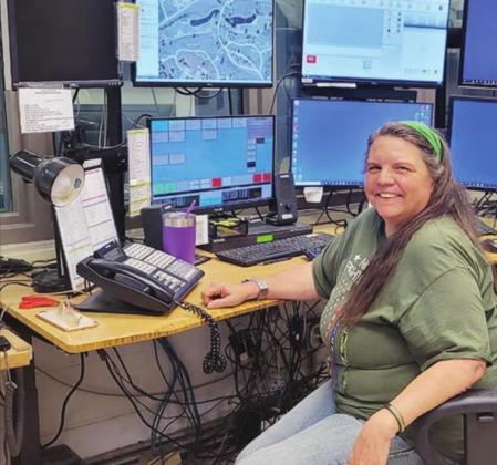 Dispatcher Celeste Kramer sits at one of the Llano County Sheriff’s Office’s two dispatch consoles. If approved, a j$1.6 million grant from the Capital Area Council of Governments could expand the dispatch to three new consoles and make other improvements. Contributed