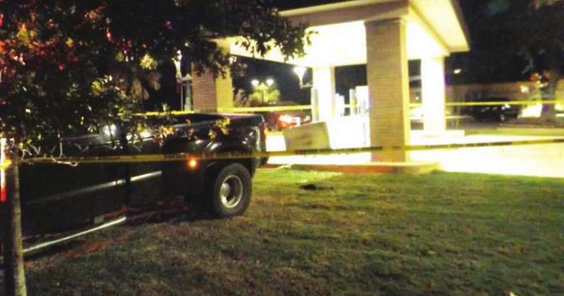 Authorities are seeking suspects after finding a pickup truck abandoned at a Horseshoe Bay bank, pictured here Nov. 5, tethered to an automated teller machine device which was yanked from its foundation. Contributed