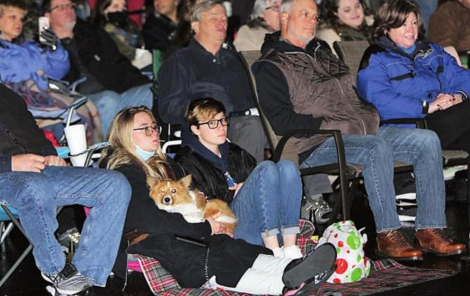 While temperatures may have gotten colder, it didn’t stop people or their pets from coming out to Main Street to hear Wilson perform.