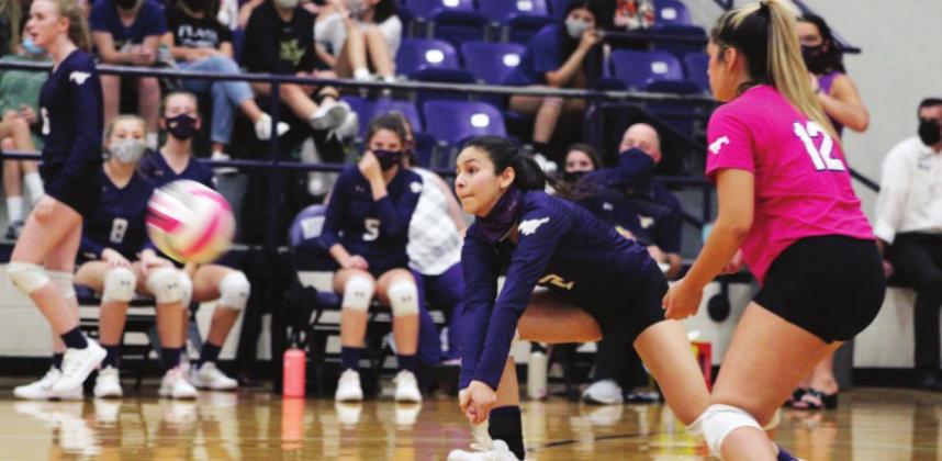 Junior Rocio Pinales and junior Alizae Rojas (12) communicate to defend Liberty Hill’s attack. Nathan Hendrix/The Highlander