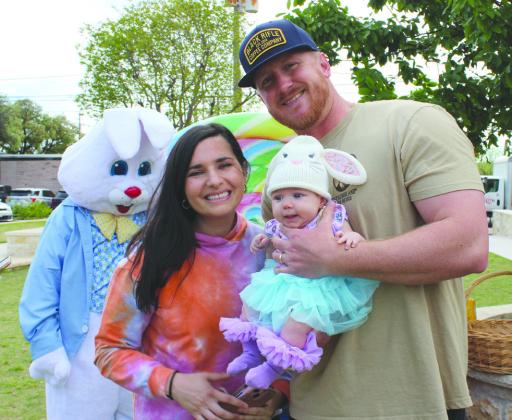 Sarah and Mike Williams and little Demi were among families who participated in the 2024 Downtown Easter Egg Hunt, coordinated by Ms Lollipop's Parties, Fun &amp; Gifts, 208 Main Street, March 29.