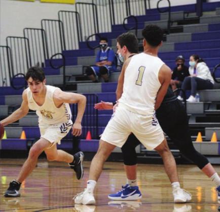 Varsity newcomers Aaron Rivera (1) and Ryan Dzurisin (23) are gaining experience during the Mustangs’ nondistrict schedule. The two young players will be leaned on heavily as teams focus on the Mustangs’ seniors. Nathan Hendrix/The Highlander