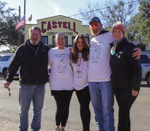 Dane and Susan Dumas, Kate Callihan, Lon Morris and Debra Kraft posed for a photo following the 2024 Polar Bear Plunge in Castell New Year's Day.