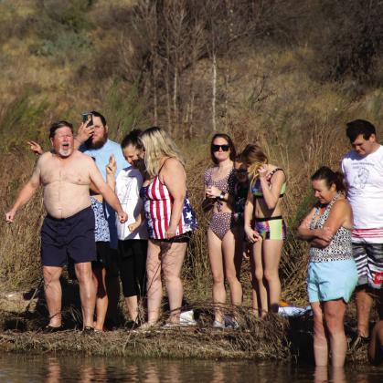 El Presidente counted down for the Polar Bear Plunge into the Llano River New Year's Day in Castell.
