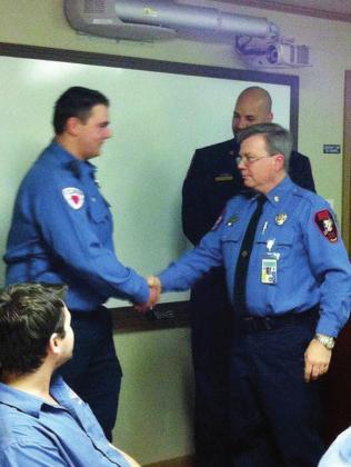 Granite Shoals Fire Rescue Firefighter/EMT Dustin Short shared a warm greeting in 2016 with his father David Short, who also worked with the agency, as well as Fire Chief Austin Stanphill.Contributed