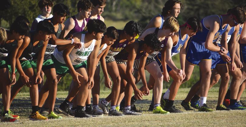 The Mustangs gear for the start of the 6A/5A race.