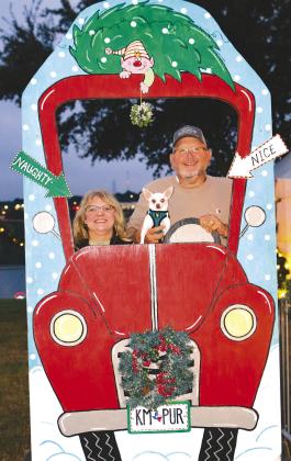 Janie, Bo and Tim Clements enjoyed their vacation in Marble Falls at the Walkway of Lights Nov. 19 in Lakeside Park.