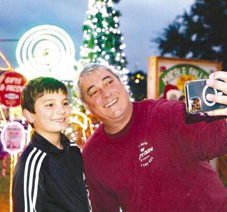 Robin and Stephan Legeny sent a selfie to grandma from Marble Falls' Walkway of Lights Nov. 19 in Lakeside Park. The venue is open from 6 to 10 p.m. The display includes hundreds of lighted sculptures and other luminous displays on a self-guided walking tour. Admission is free.