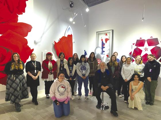 Contributed photos Marble Falls High School 11th- and 12thgrade advanced art students surrounded their art teacher, Kim Thomas, and Benini (center) on the occasion of their recent visit to the Museo Benini art museum, 3440 FM 2147 East in Burnet County.