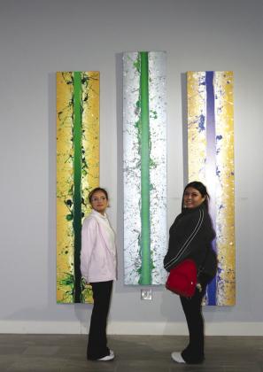 From left, Diana Flores and Ashley Gonzalez, art students at Marble Falls High School, studied works of an abstract nature recently at the Museo Benini art museum, 3440 FM 2147 East just outside Marble Falls.