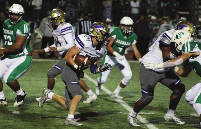 Last year’s meeting (pictured here) between the Marble Falls Mustangs and the Brenham Cubs ended in a 41-13 game. This season, the Mustangs are looking for revenge in the first round of the playoffs on Friday, Dec. 11 at Cub Stadium. Nathan Hendrix/The Highlander