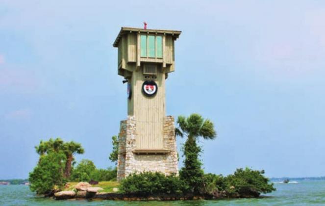 The Horseshoe Bay Lighthouse, pictured above, is one of the most recognizable landmarks in this 50-year old community and its image graces the cover of the new book, “The Story of Horseshoe Bay, Texas — 1971-2021.” Kelly McDuffie/Special to The Highlander