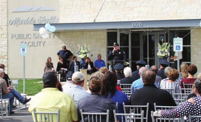 In 2017, MFPD Chief Mark Whitacre addressed the crowd (above) during the grand opening of the new Public Safety Facility, 606 Avenue N. In 2020, he – on behalf of the local police agency – accepted a certificate of recognition (below) from the Retired Chief Bruce Mills of the Texas Police Chiefs Association Foundation. File photos